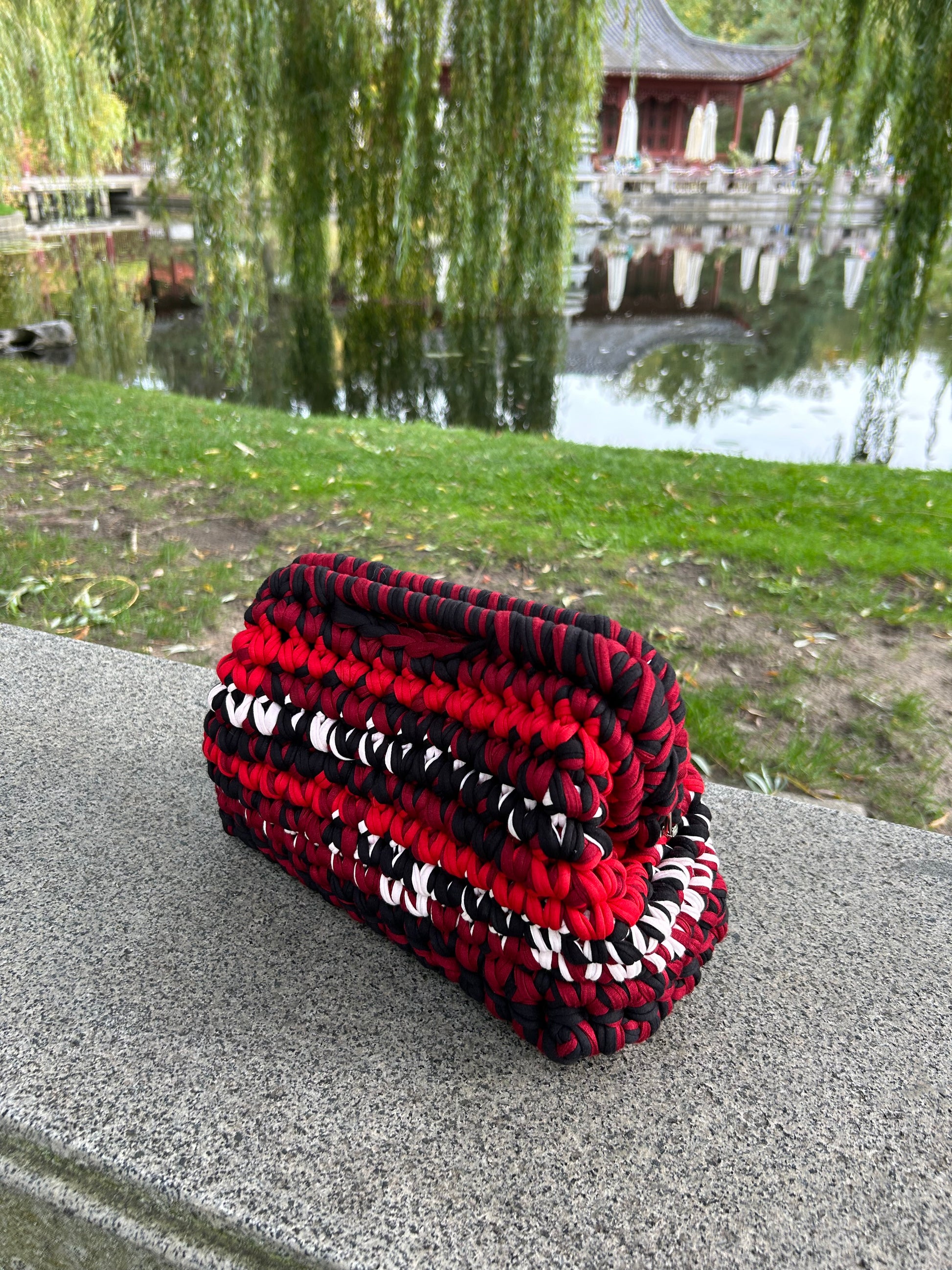 cherry red crochet clutch bag