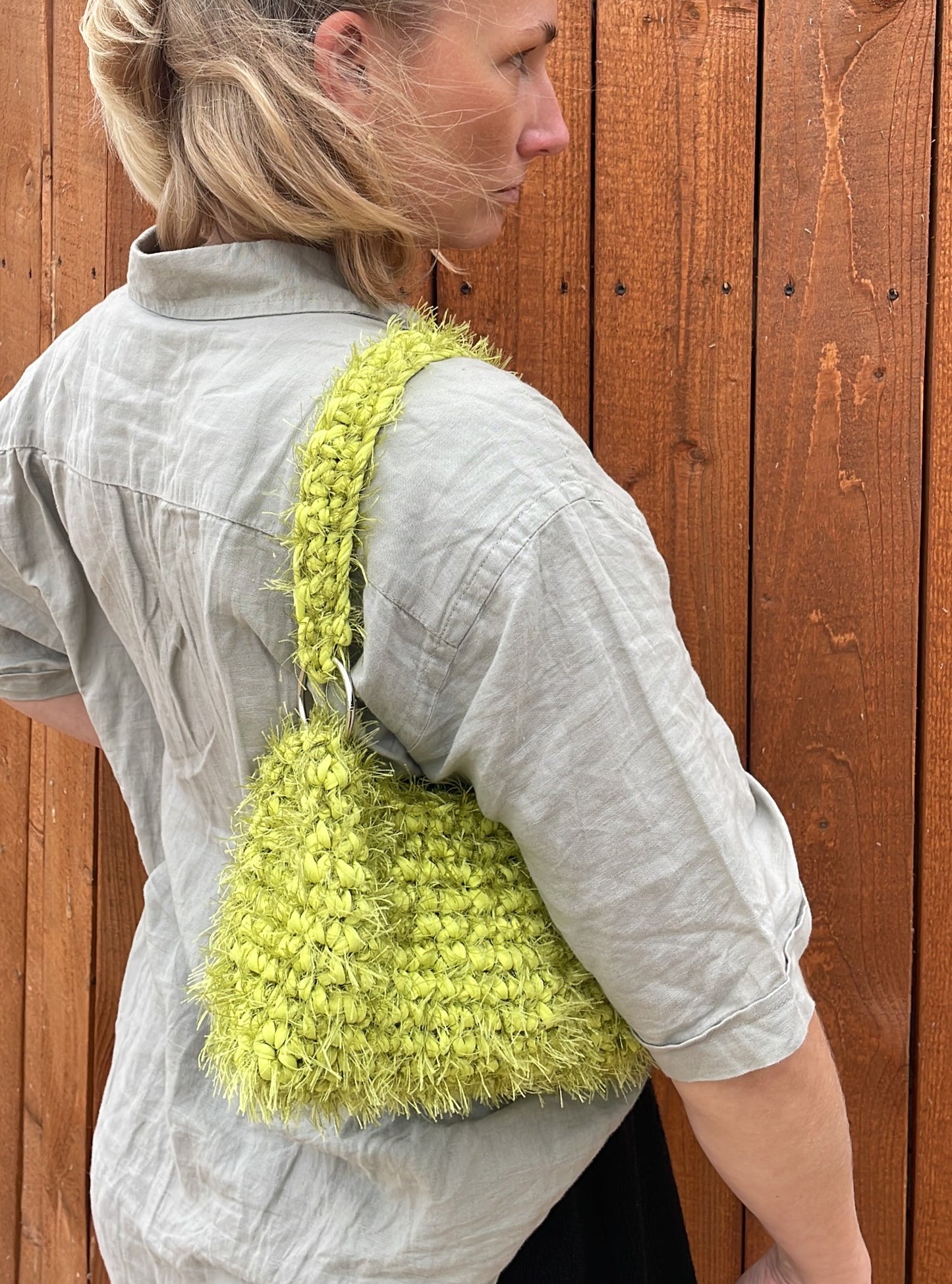 green fluffy crochet bag